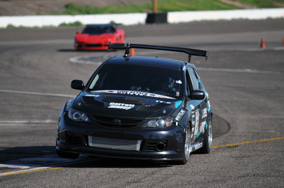 Taylor Wilson pulling a wheel at Firebird Raceway in his 09 Subaru Wrx
